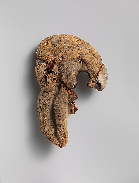 Pendant: Ajax carrying the body of Achilles. Etruscan, 6th–5th century BCE, Amber