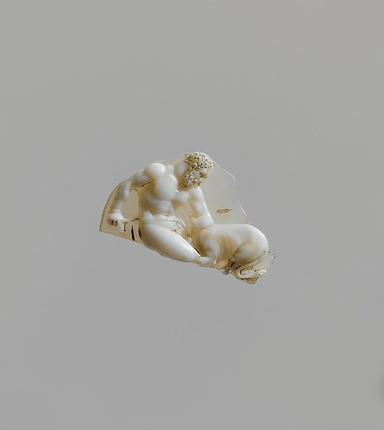 Sardonyx cameo fragment with Hercules tying up Cerberus. Greek or Roman, 1st century BCE–1st century CE, Sardonyx