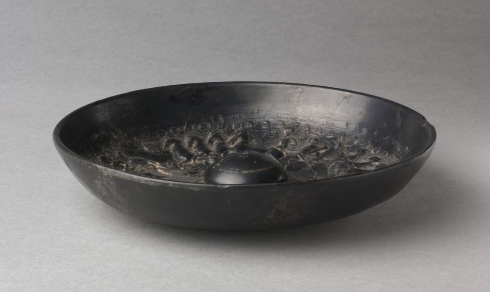 Black-Gloss Mesomphalic Phiale (Libation Bowl): Apotheosis of Herakles. South Italian, Campanian (Calenian), 200s BCE, ceramic
