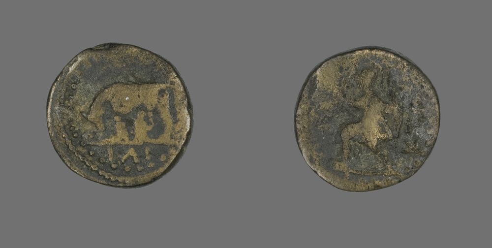 Coin Depicting a She-Wolf Nursing Romulus and Remus. Rome, 117-192, Bronze